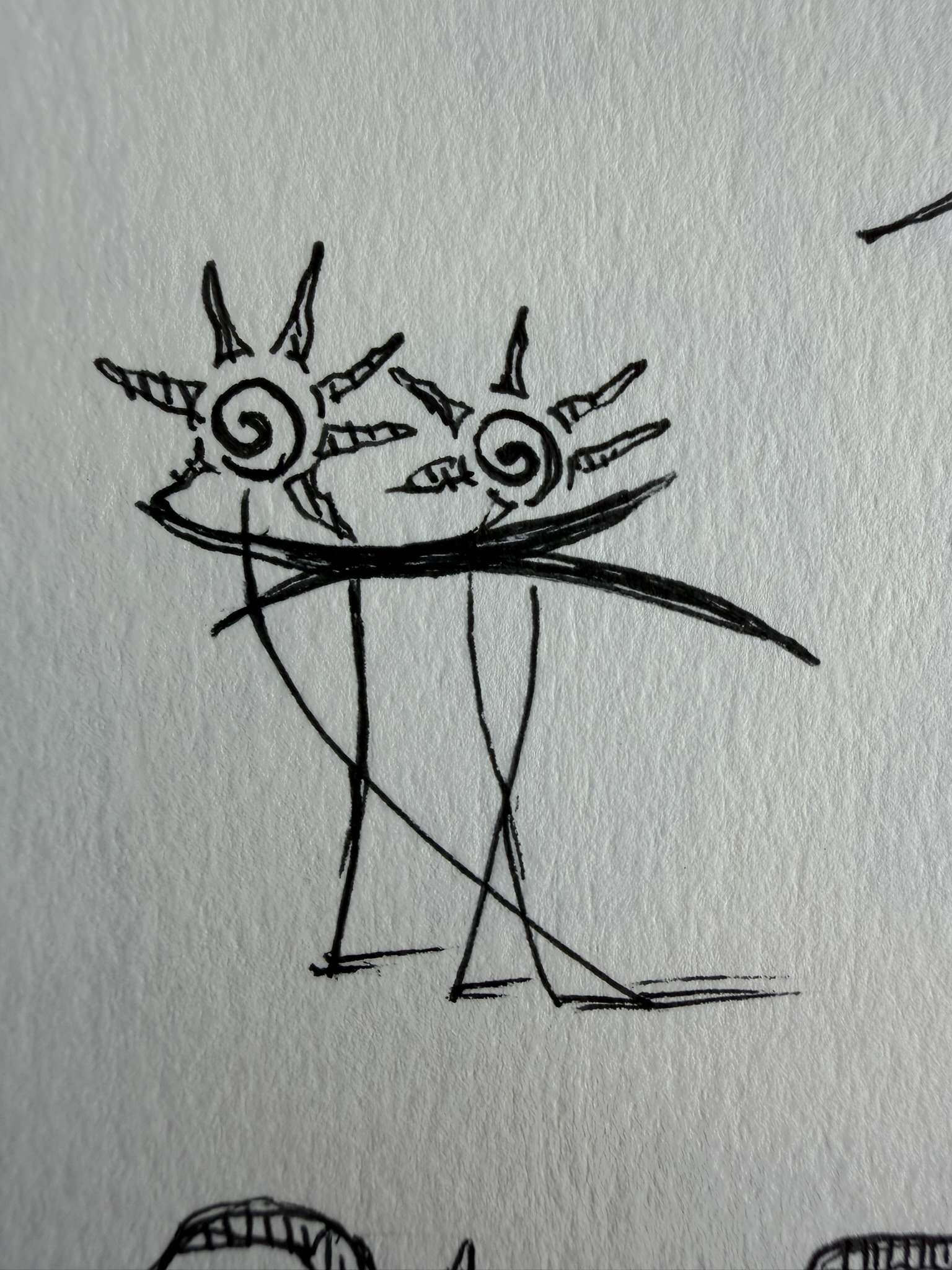Original Soleil sketchbook drawing of two figures beneath hand-drawn sun marks